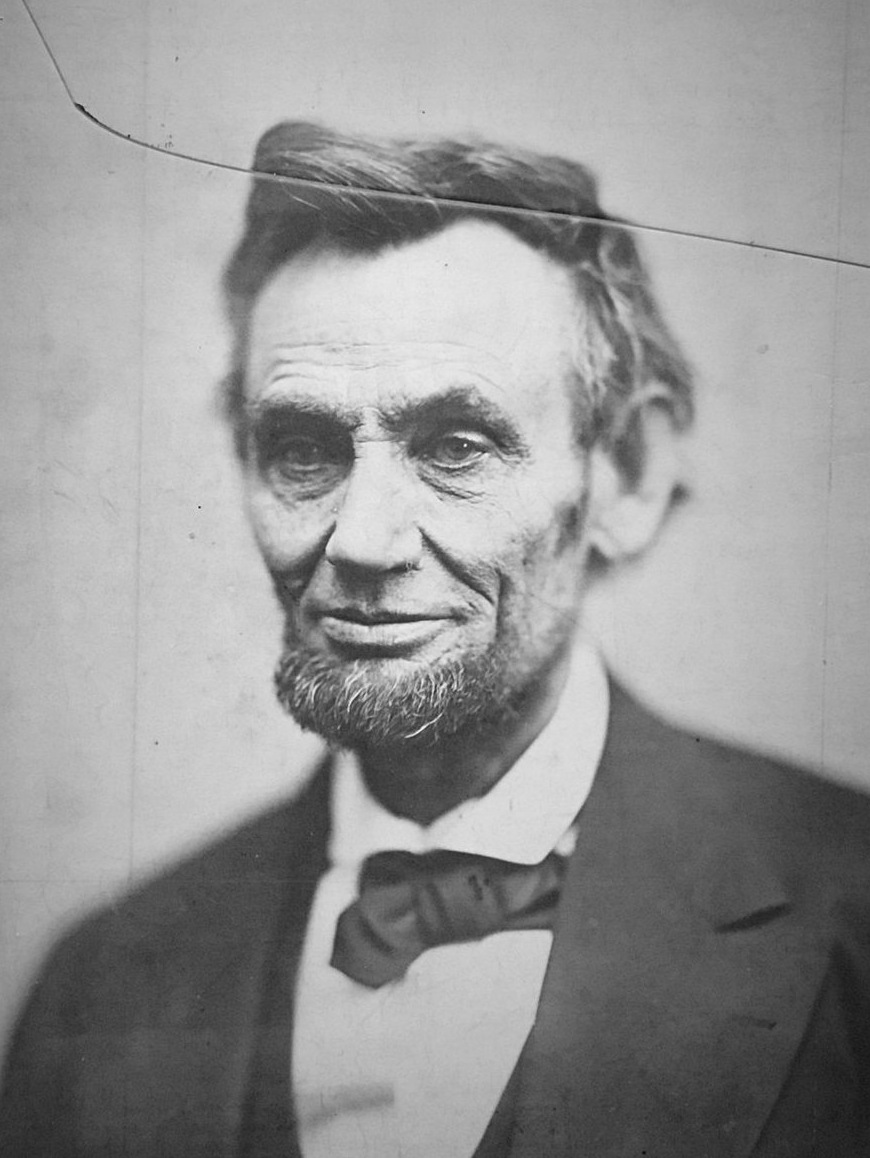 Cracked photograph before restoration