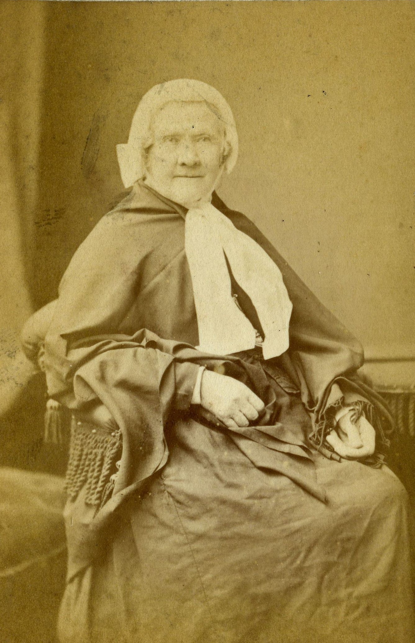 A faded portrait, pale with age
