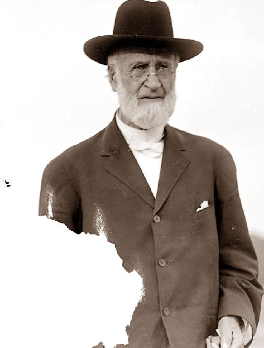 Torn photograph before restoration